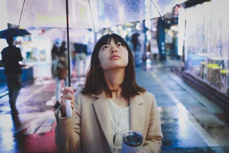 Woman under umbrella