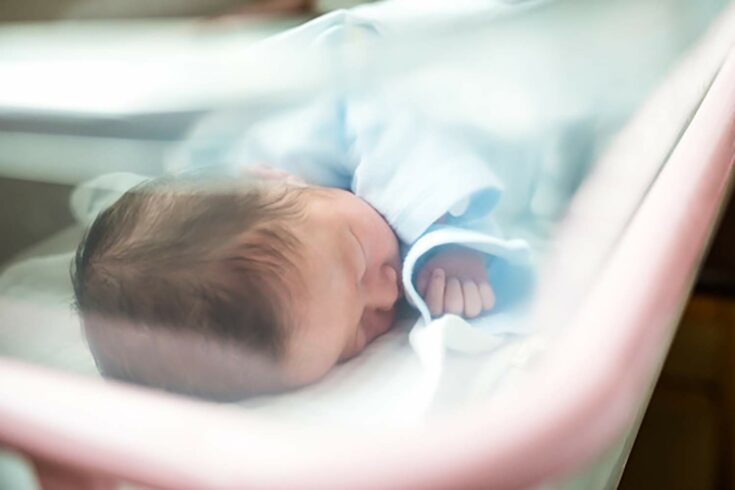 Baby in crib