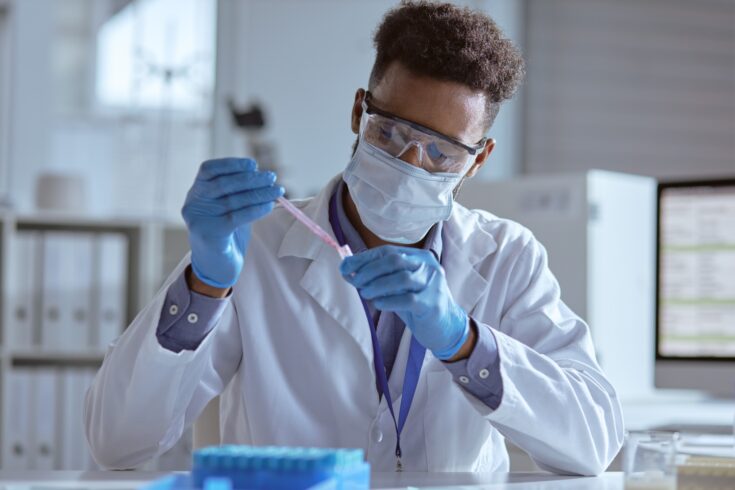 Young scientist working with samples in a laboratory