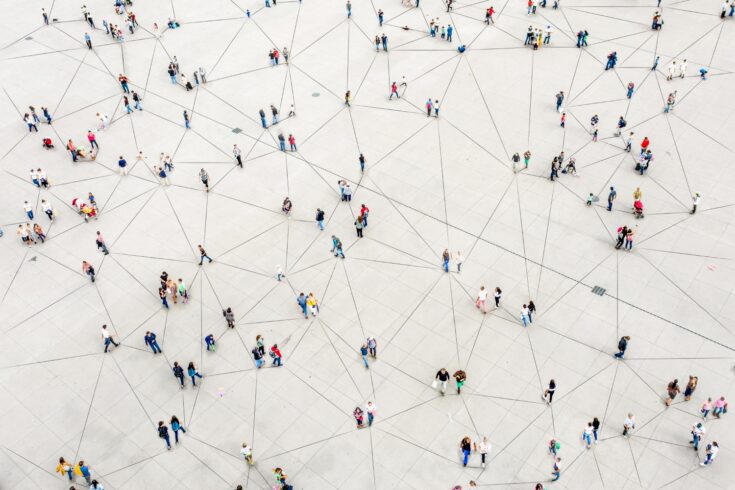 Aerial view of crowd connected by lines