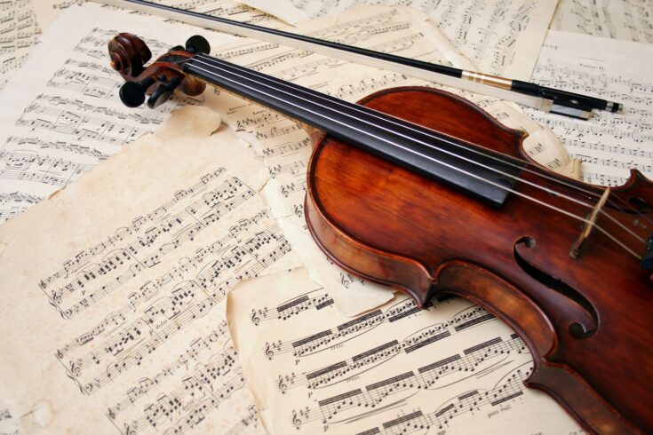 Violin with bow and music sheet