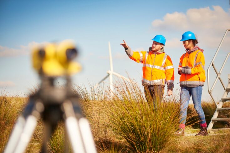 Male and female windfarm engineers