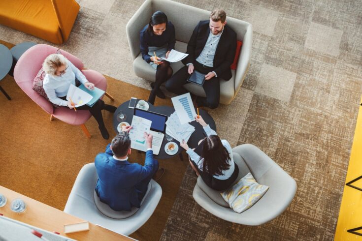 Group of business people in office cafeteria