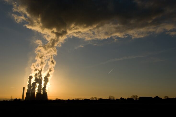 Coal fired UK power station blocking out a sunrise