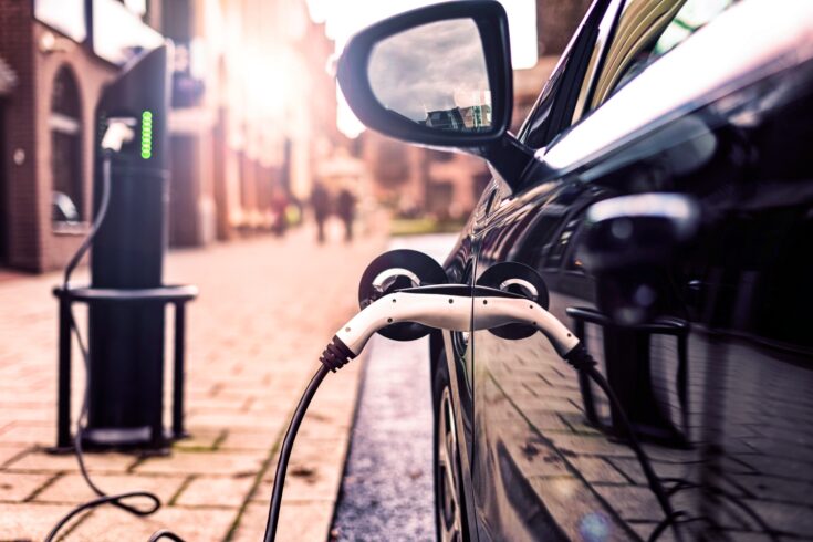 Electric vehicle in park street charging station