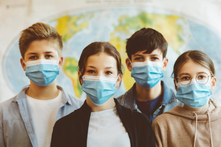 Group of high school students at school, wearing N95 Face masks.