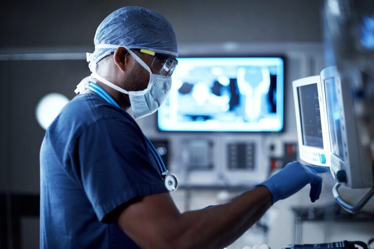 Doctor examining patient's vitals