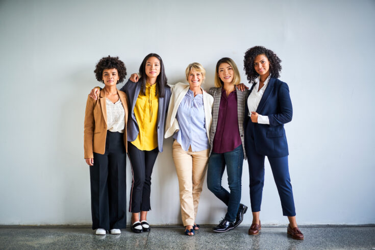 Confident multi-ethnic businesswomen at office