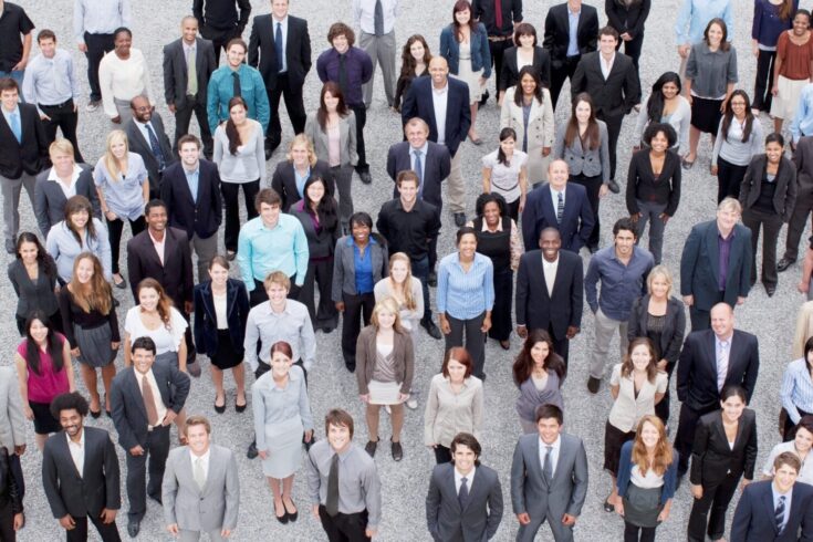 Portrait of business people in crowd