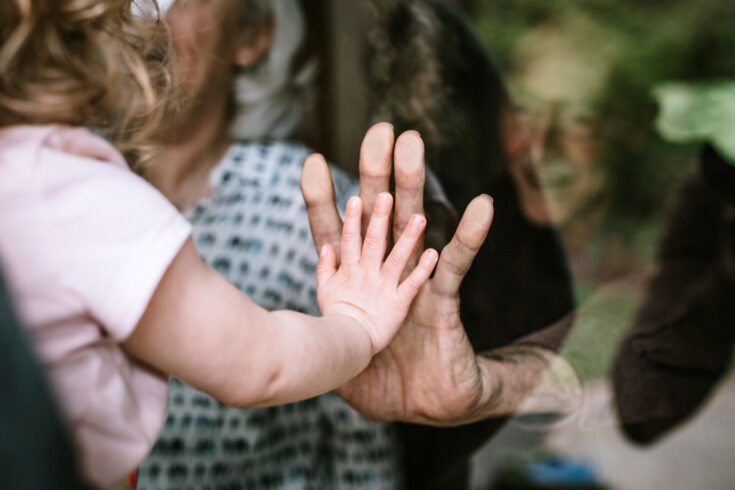 Little Girl Visits Grandparents Through Window