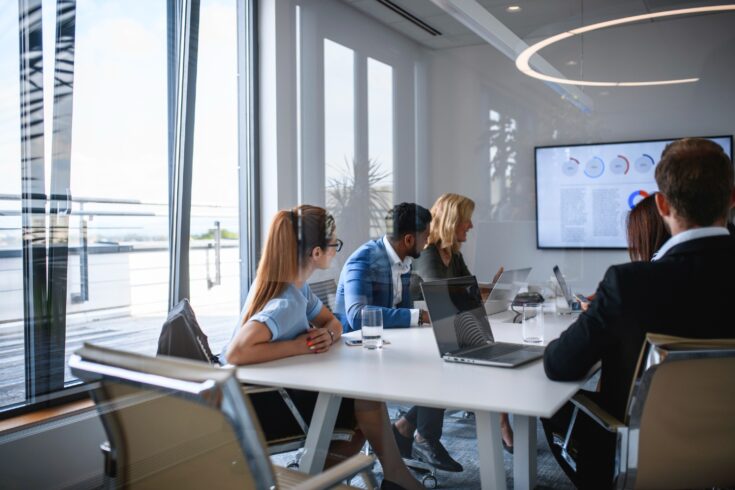 Executive team meeting in an office