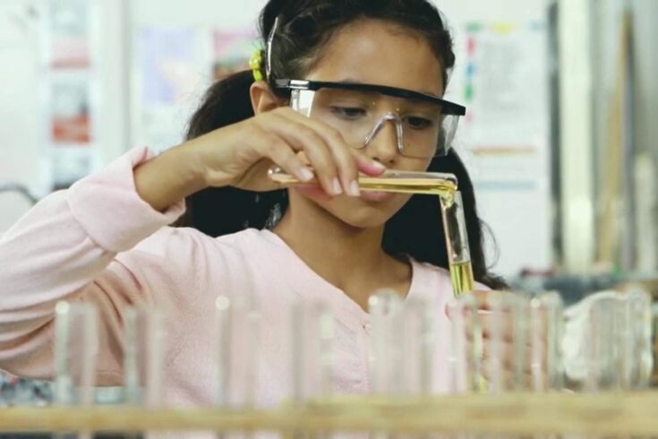 Girl doing chemistry experiment