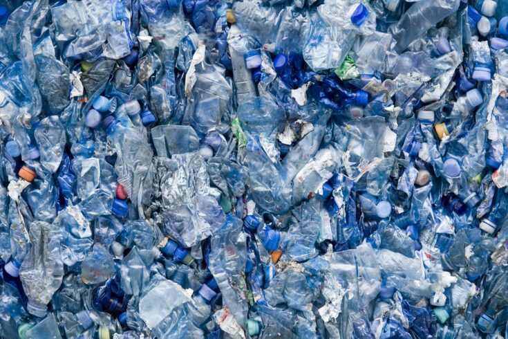 A pile of blue plastic bottle garbage.