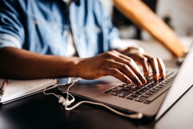 Entrepreneur working on laptop online