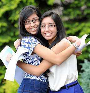 Twins celebrating A-level results