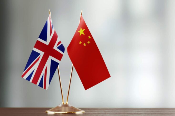 British and Chinese flag pair on desk