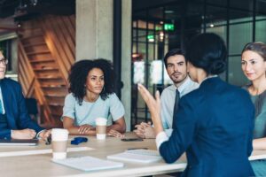 Diverse group of people discussing with each other