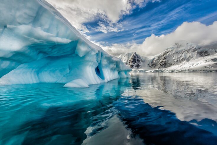 Iceberg floats in Andord Bay on Graham Land, Antarctica