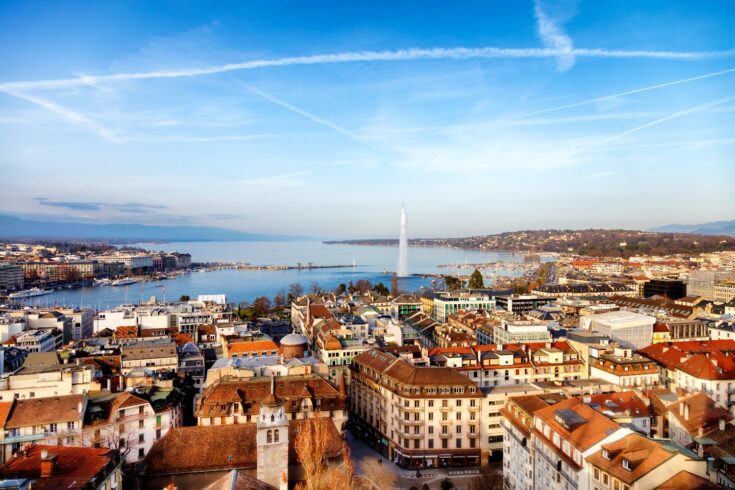 Aerial view of Geneva, Lake Geneva with famous fountain Jet d´Eau are seen in the background, Switzerland,