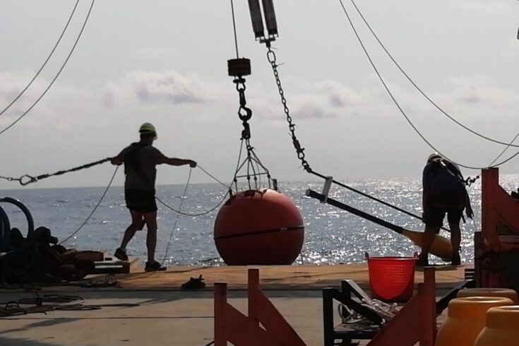 Winch lifting ocean sensor on to ship