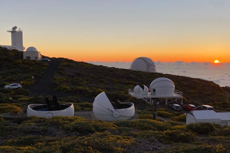 GOTO at the Roque de los Muchachos Observatory at La Palma. Behind the observatories, the sun is setting.
