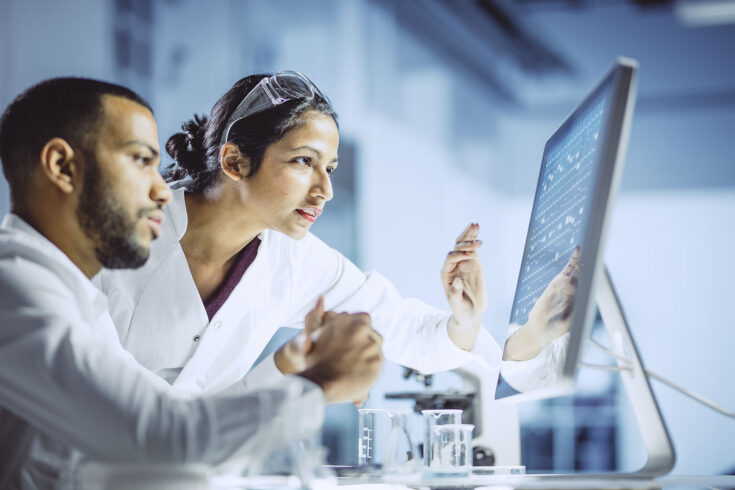 Two scientists working in the laboratory.