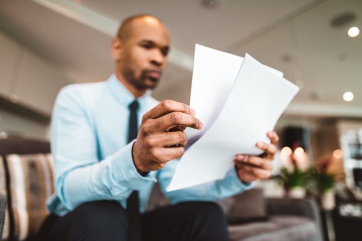 Businessman reading reading a report