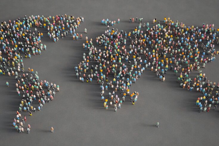 3d low poly people gathered together and formed a World map.