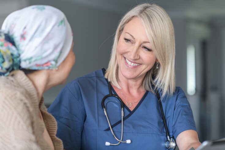 Female doctor consults patient with cancer