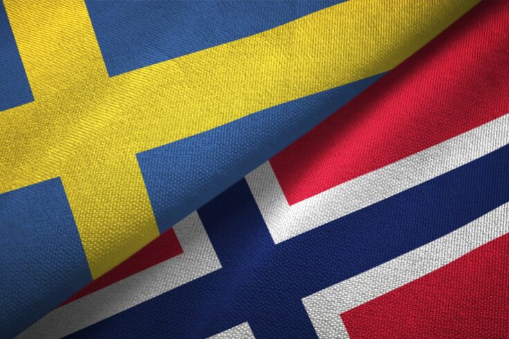 Norway and Sweden two flags together textile cloth fabric texture