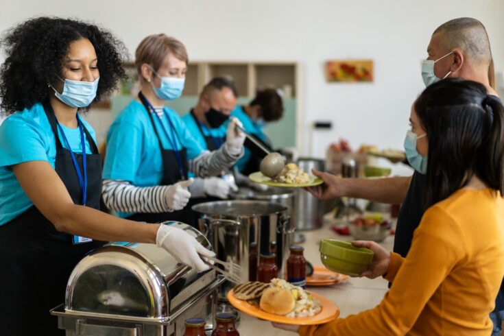 Serving hot meals in a food bank