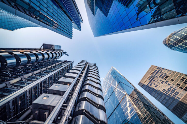 Looking upwards at the skyline of London’s financial district.