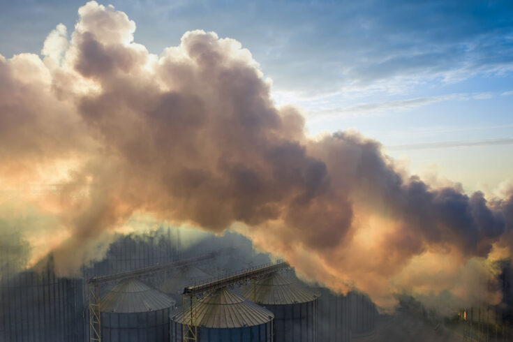 Plant or elevator, harmful emissions into the atmosphere from heavy industry are causing global warming and climate change.