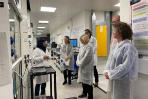 Lynn touring Continuous Manufacturing and Advanced Crystallisation (CMAC), a research facility for manufacturing processes in the medicine supply chain at Strathclyde University. Credit: UK Research and Innovation