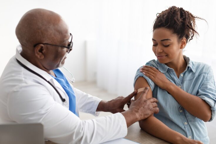 Pregnant woman getting vaccinated