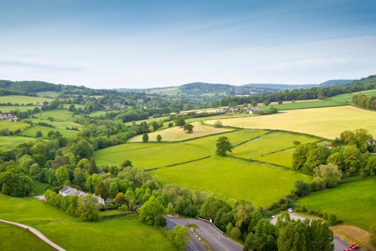 aerial view of gently rolling patchwork farmland