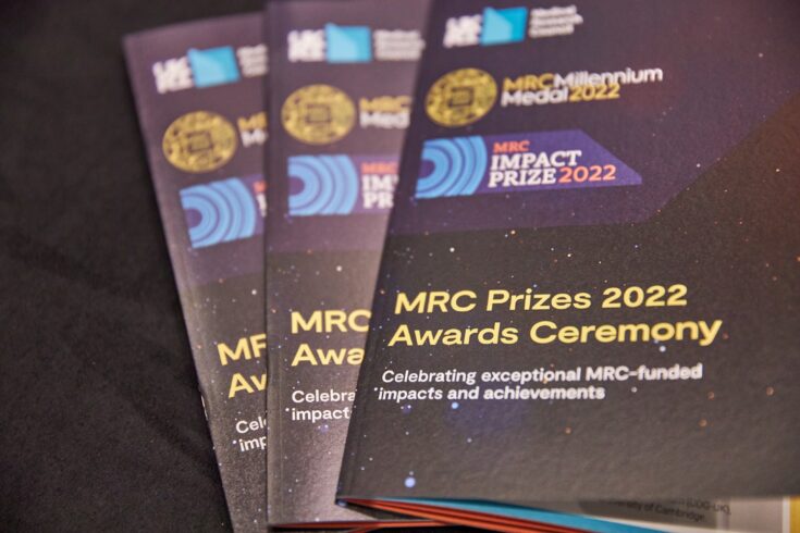 Three event programmes showing the front cover for the MRC Prizes 2023 Awards Ceremony