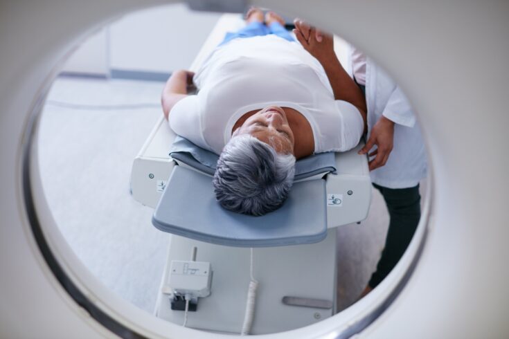 Shot of a senior woman being comforted by a doctor before and MRI