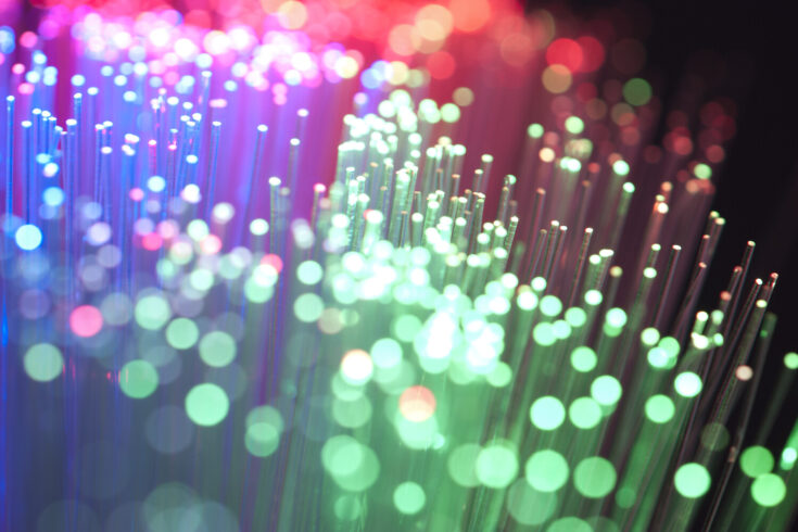 Blue, Red and green fibre optical cables on a black background
