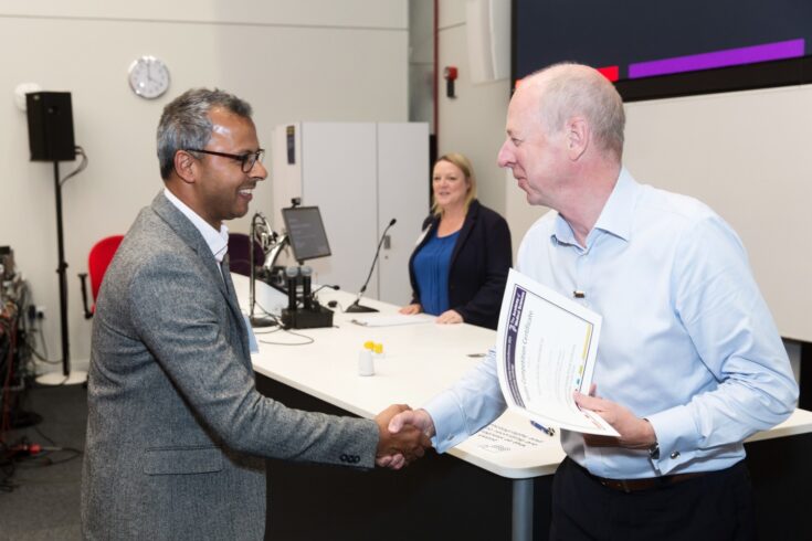 Romit Samanta receiving a poster competition prize at the Academy of Medical Sciences’ Clinical Academics in Training Conference in June