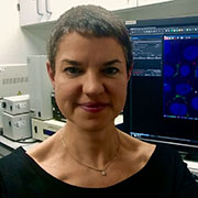 Headshot of Professor Maddy Parsons.