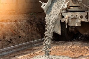 Cement being poured on a construction site