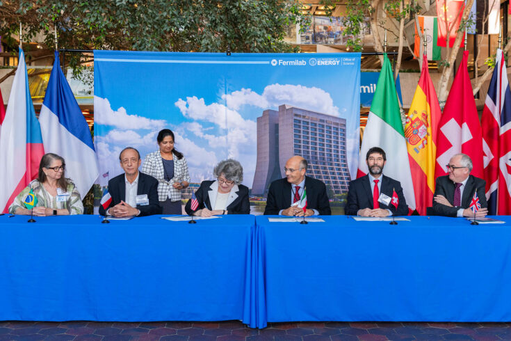 Delegates from various countries signing the MOU to contribute to the DUNE experiment. From left to right: Maria Luiza Moretti (Vice-Rector, Unicamp), Reynald Pain (Director, IN2P3), Hema Ramamoorthi (Fermilab Director of Office of International Engagements), Lia Merminga (Fermilab Director), Marco Pallavicini (INFN Vice-President), Professor Dr Michele Weber (Director, Laboratory for High Energy Physics, University of Bern), Professor Mark Thomson (Executive Chair, STFC).