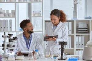 Two scientists working together in a lab