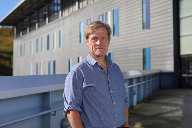 Roger Eccleston stood outside the ISIS Neutron and Muon Source.