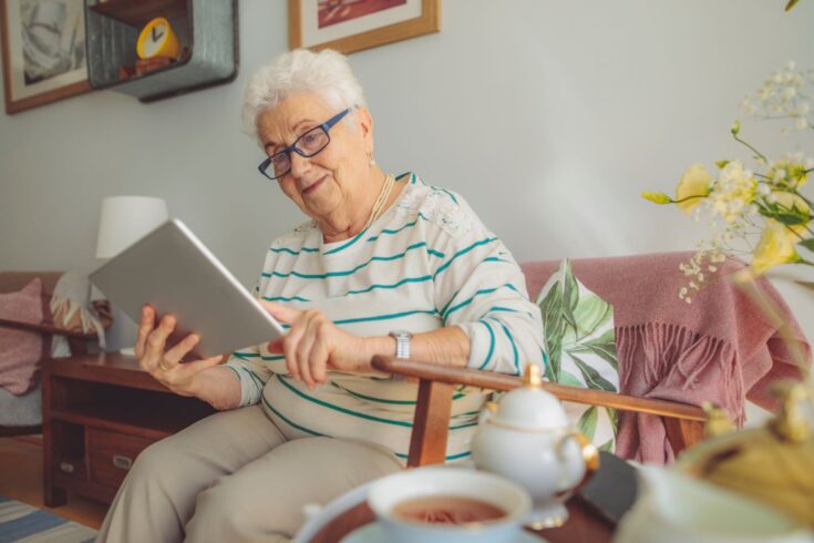 A person with dementia using technology at home.