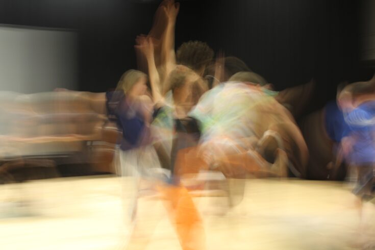 Blurred dancers in a dance studio