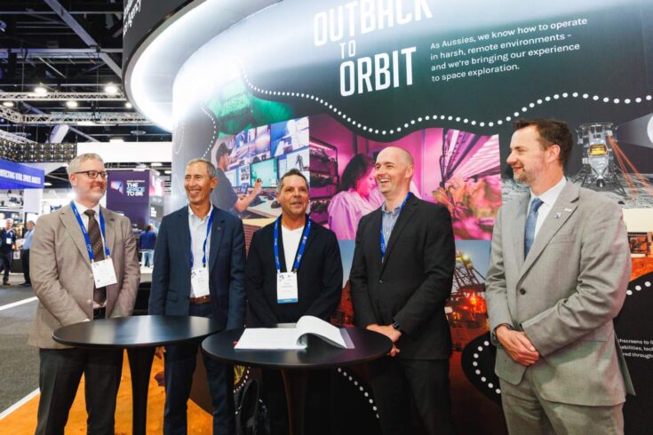 Members of NISA at signing at 76th annual conference in Sydney, Australia