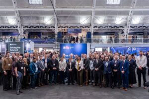 Large group of people standing together at the UK National Quantum Technologies Showcase.