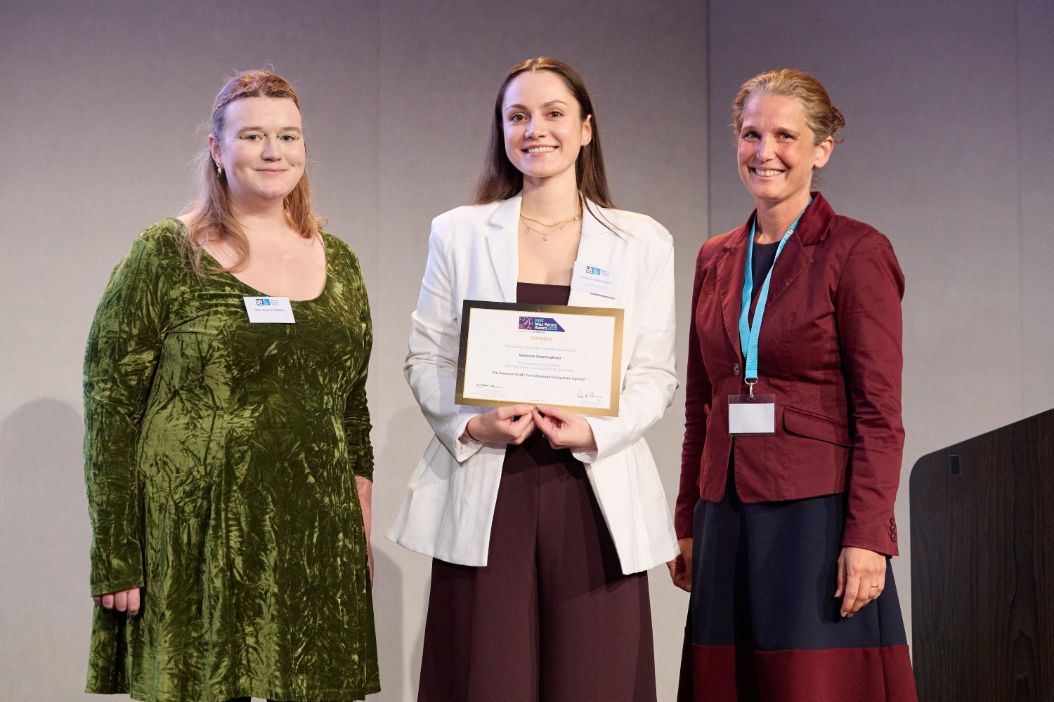 Vanessa winning the writing category of the MRC Max Perutz Award 2025. From left to right: Elspeth Oakley (Judging Panel Public Member), Vanessa, and Dr Joanna Robinson (Chair of the Judging Panel)
